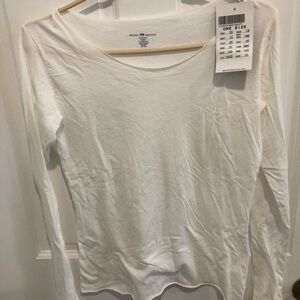 Brandy Melville white long sleeve t-shirt. Never worn. One size fits all.